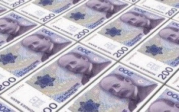 Hvis du ser på den gamle 200-lappen under ultrafiolett lys, får du deg en overraskelse. (Foto: Shutterstock / NTB scanpix) Hvis du ser på den gamle 200-lappen under ultrafiolett lys, får du deg en overraskelse. (Foto: Shutterstock / NTB scanpix)