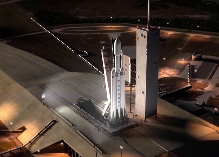 Falcon Heavy vil bestå av en modifisert Falcon-9 i midten og ytterligere to Falcon 9 førstetrinn festet på sidene. Dette vil øke løfteevnen noe under tre ganger i forhold til Falcon 9. (Illustrasjon: Fra video laget av SpaceX.) Falcon Heavy vil bestå av en modifisert Falcon-9 i midten og ytterligere to Falcon 9 førstetrinn festet på sidene. Dette vil øke løfteevnen noe under tre ganger i forhold til Falcon 9. (Illustrasjon: Fra video laget av SpaceX.)