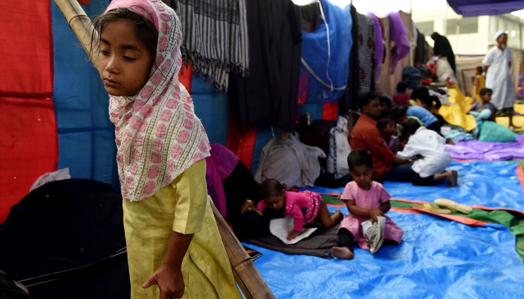 De muslimske Rohingyaene i Myanmar har i flere tiår blitt utsatt for forfølgelser. Landets gryende demokratisering har paradoksalt nok ført til en eskalering av forfølgelsene. Over 700 000 rohingyaer er nå på flukt. Her fra en flyktningleir i New Delhi i april 2018. (Foto: AFP Photo / Money Sharma) De muslimske Rohingyaene i Myanmar har i flere tiår blitt utsatt for forfølgelser. Landets gryende demokratisering har paradoksalt nok ført til en eskalering av forfølgelsene. Over 700 000 rohingyaer er nå på flukt. Her fra en flyktningleir i New Delhi i april 2018. (Foto: AFP Photo / Money Sharma)