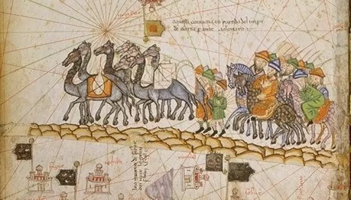 En karavane som reiser langs silkeveien rundt år 1380. Illustrasjonen er fra det Katalanske Atlaset. (Bilde: Offentlig eiendom)