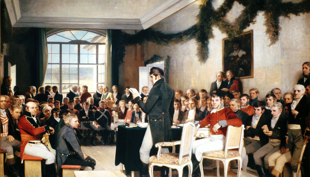 Det er den amerikanske og franske grunnloven som blåser inn i Rikssalen på Eidsvoll, mener kunsthistorikeren Eivind Torkjelsson. Det første utkastet av maleriet til Oscar Wergeland så ikke slik ut. Der er gardinene trukket for og vinduene lukket. (Bilde: Maleri av Oscar Wergeland, fotografert av Erlend Bjørtvedt (CC-BY-SA)) Det er den amerikanske og franske grunnloven som blåser inn i Rikssalen på Eidsvoll, mener kunsthistorikeren Eivind Torkjelsson. Det første utkastet av maleriet til Oscar Wergeland så ikke slik ut. Der er gardinene trukket for og vinduene lukket. (Bilde: Maleri av Oscar Wergeland, fotografert av Erlend Bjørtvedt (CC-BY-SA))