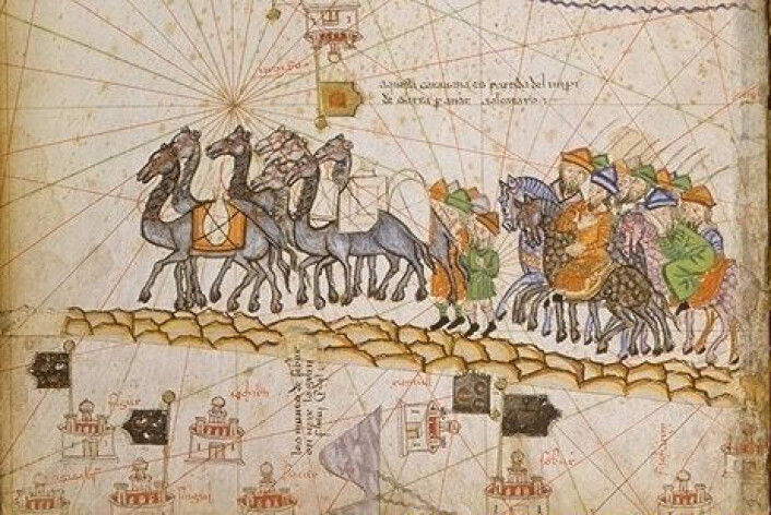 En karavane på Silkeveien, fra det såkalte Katalanske atlaset, laget omkring 1375. (Foto: (Bilde: Offentlig eiendom)) En karavane på Silkeveien, fra det såkalte Katalanske atlaset, laget omkring 1375. (Foto: (Bilde: Offentlig eiendom))