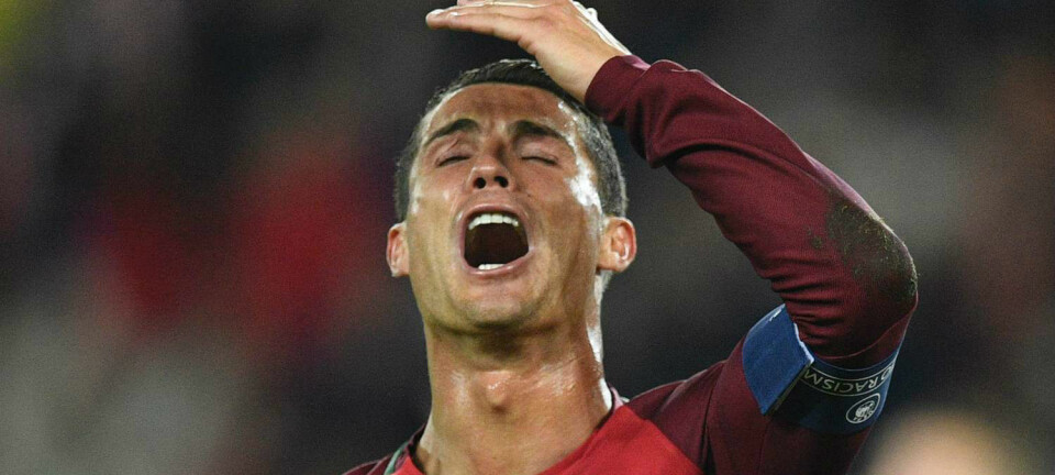 Portugals store stjerne Cristiano Ronaldo rett etter å ha bommet på straffe i EM-kampen mot Østerrike.  (Foto: Martin Bureau/AFP Photo/NTB Scanpix)