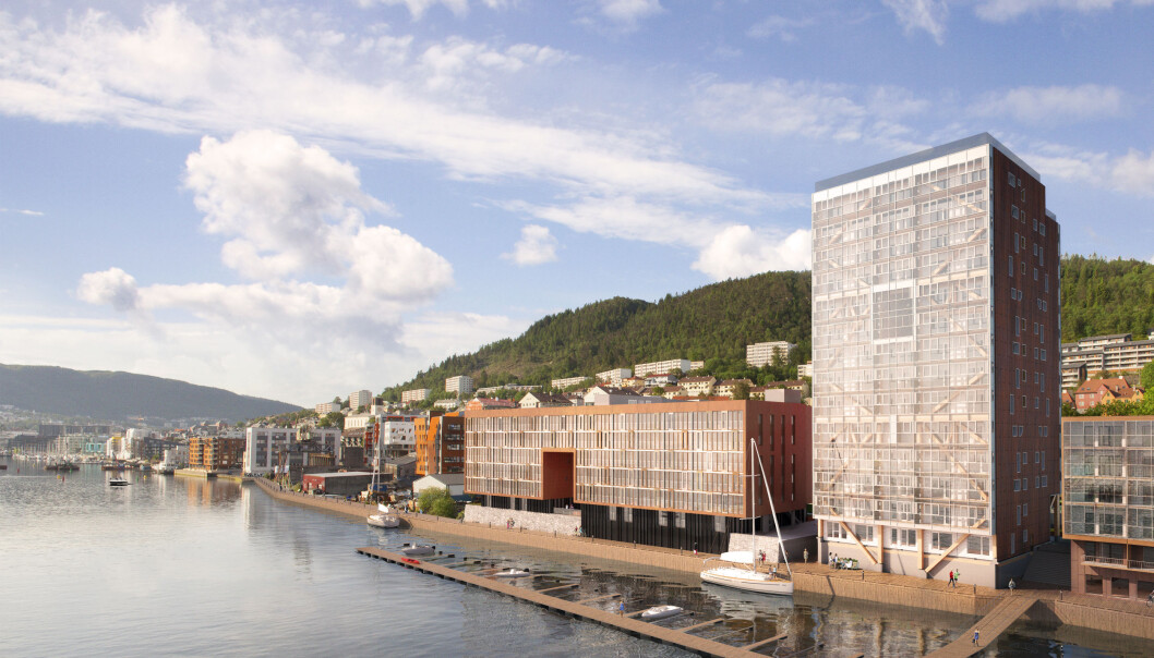 Boligblokka «Treet» i Bergen er verdens høyeste trebygning med sine 14 etasjer og 64 leiligheter. Vi kunne bygd nærmere 2500 slike bygninger hvert år med den tilgangen vi har hatt på tømmer i Norge de siste 500 årene, skriver artikkelforfatterne. (Illustrasjon: Snølys) Boligblokka «Treet» i Bergen er verdens høyeste trebygning med sine 14 etasjer og 64 leiligheter. Vi kunne bygd nærmere 2500 slike bygninger hvert år med den tilgangen vi har hatt på tømmer i Norge de siste 500 årene, skriver artikkelforfatterne. (Illustrasjon: Snølys)