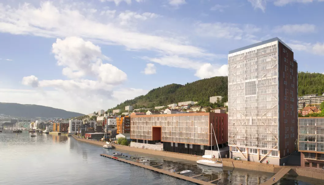 Boligblokka «Treet» i Bergen er verdens høyeste trebygning med sine 14 etasjer og 64 leiligheter. Vi kunne bygd nærmere 2500 slike bygninger hvert år med den tilgangen vi har hatt på tømmer i Norge de siste 500 årene, skriver artikkelforfatterne. (Illustrasjon: Snølys)