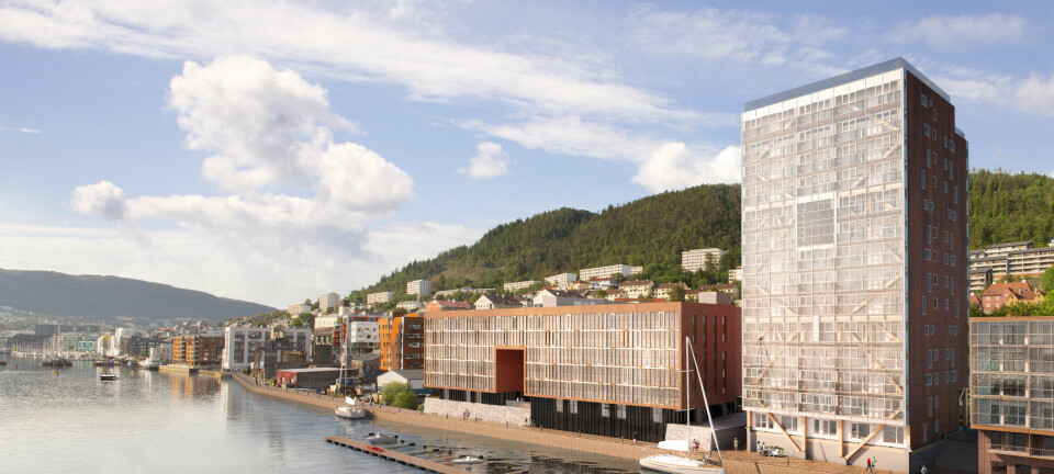 Boligblokka «Treet» i Bergen er verdens høyeste trebygning med sine 14 etasjer og 64 leiligheter. Vi kunne bygd nærmere 2500 slike bygninger hvert år med den tilgangen vi har hatt på tømmer i Norge de siste 500 årene, skriver artikkelforfatterne. (Illustrasjon: Snølys)