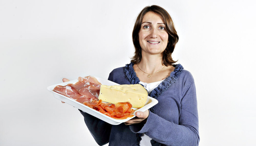 Valérie Lengard Almli studies traditional food, here represented by ham, salmon and cheese. (Photo: Jon-Are Berg-Jacobsen, Nofima) Valérie Lengard Almli studies traditional food, here represented by ham, salmon and cheese. (Photo: Jon-Are Berg-Jacobsen, Nofima)