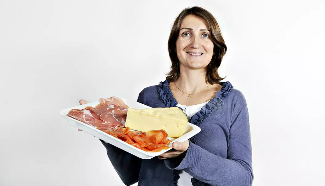 Valérie Lengard Almli studies traditional food, here represented by ham, salmon and cheese. (Photo: Jon-Are Berg-Jacobsen, Nofima)