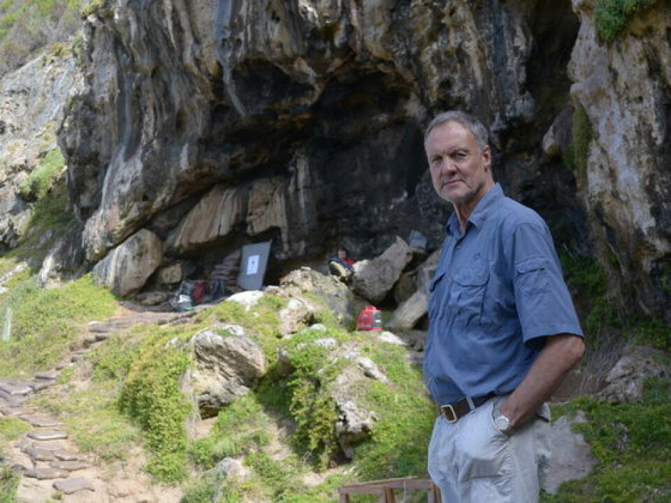 Professor Christopher Henshilwood outside Blombos Cave in South Africa, where his work combines excavations with climate simulations better to understand human history. (Photo: TRACSYMBOLS)