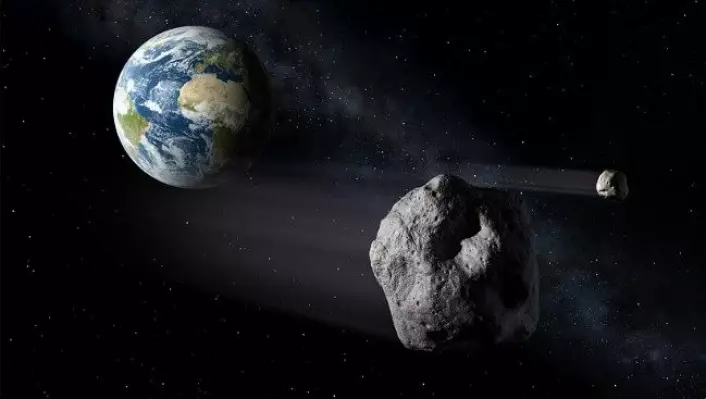 Asteroiden som fløy forbi Jorda på søndag var like bred som et passasjerfly. Her er asteroiden illustrert idet den farer forbi planeten vår. (Foto: ESA- P. Carill)