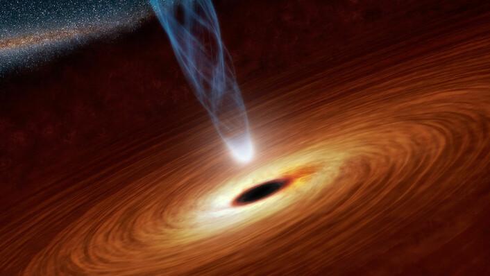Tyngdekraften fra et supermassivt hull suger til seg gass fra en nærliggende stjerne. Gassen trekkes innover mot stjernen i en spiral. Usynlig, energirik røntgen- og gammastråling kommer fra en jetstråle av gass opp fra skiven. Disse strålene varmer opp gassen i skiven, slik at den gløder. (Foto: (Illustrasjon: NASA/JPL Caltech))