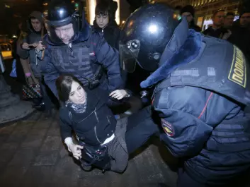 Pussy Riot member Tolokonnikova is detained by police at a protest in central Moscow. (Photo: Maxim Shemetov, Reuters)