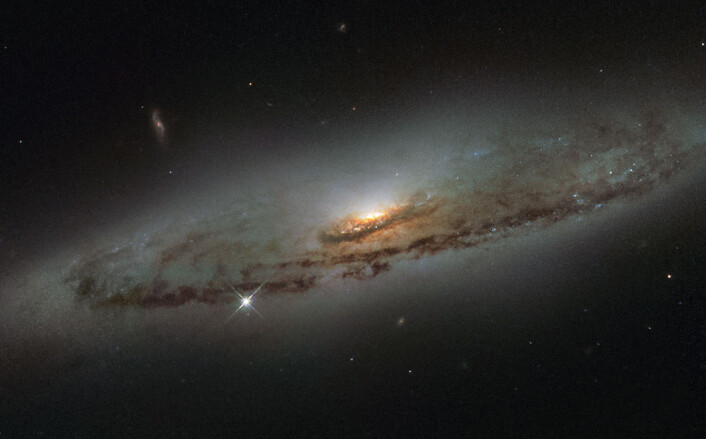 Galaksen NGC 4845 i stjernebildet Jomfruen (Virgo), fotografert med romteleskopet Hubble. (Foto: ESA/Hubble) Galaksen NGC 4845 i stjernebildet Jomfruen (Virgo), fotografert med romteleskopet Hubble. (Foto: ESA/Hubble)
