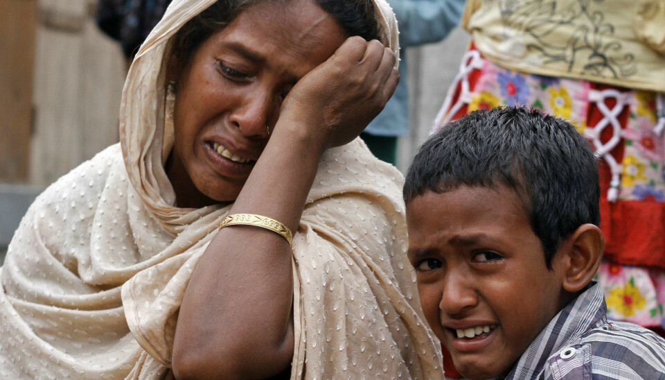 Villagers from Muslim communities affected by ethnic violence weep at a relief camp. (Photo: Utpal Baruah/Reuters)