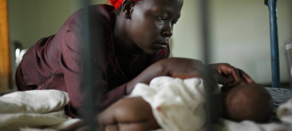 Mor og barn, begge hiv-smittede, i Kangulumira, Uganda. (Foto: Tomas Van Houtryve, Corbis)