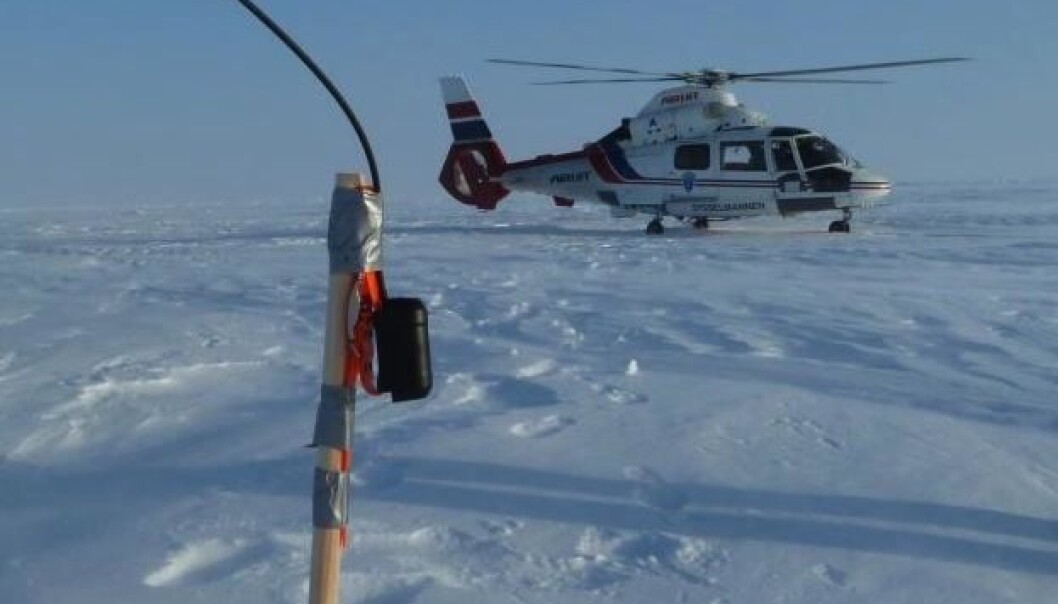 Thickness of the ice was determined by an instrument hanging from the helicopter while flying at low altitudes. These measurements were compared with snow and ice samples and radar images from the satellite, and used to develop an analysis tool for sea ice. (Photo: Sebastian Gerland, Norwegian Polar Institute) Thickness of the ice was determined by an instrument hanging from the helicopter while flying at low altitudes. These measurements were compared with snow and ice samples and radar images from the satellite, and used to develop an analysis tool for sea ice. (Photo: Sebastian Gerland, Norwegian Polar Institute)