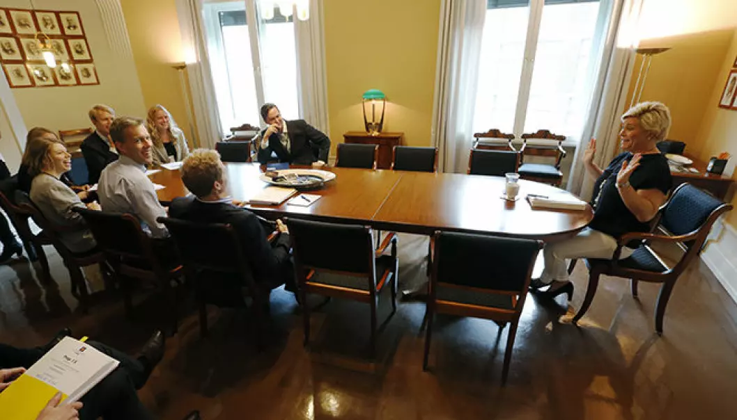 Economists are powerful in the Norwegian Ministry of Finance, according to Johan Christensen. Pictured: Minister of Finance Siv Jensen and bureaucrats in the Ministry preparing a presentation of the National Budget, 6 October 2014. (Photo: Lise Åserud / NTB Scanpix)