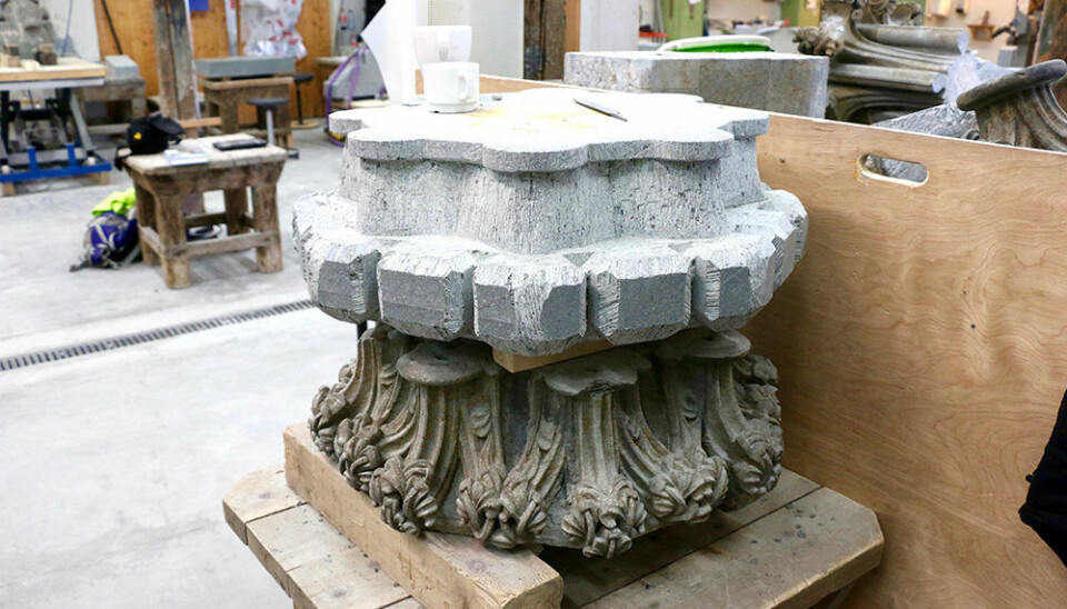 Still life with coffee cup in the stone carver's workshop. The original top to a column is underneath a replacement top that is just being roughed out. (Photo: Nancy Bazilchuk, NTNU)