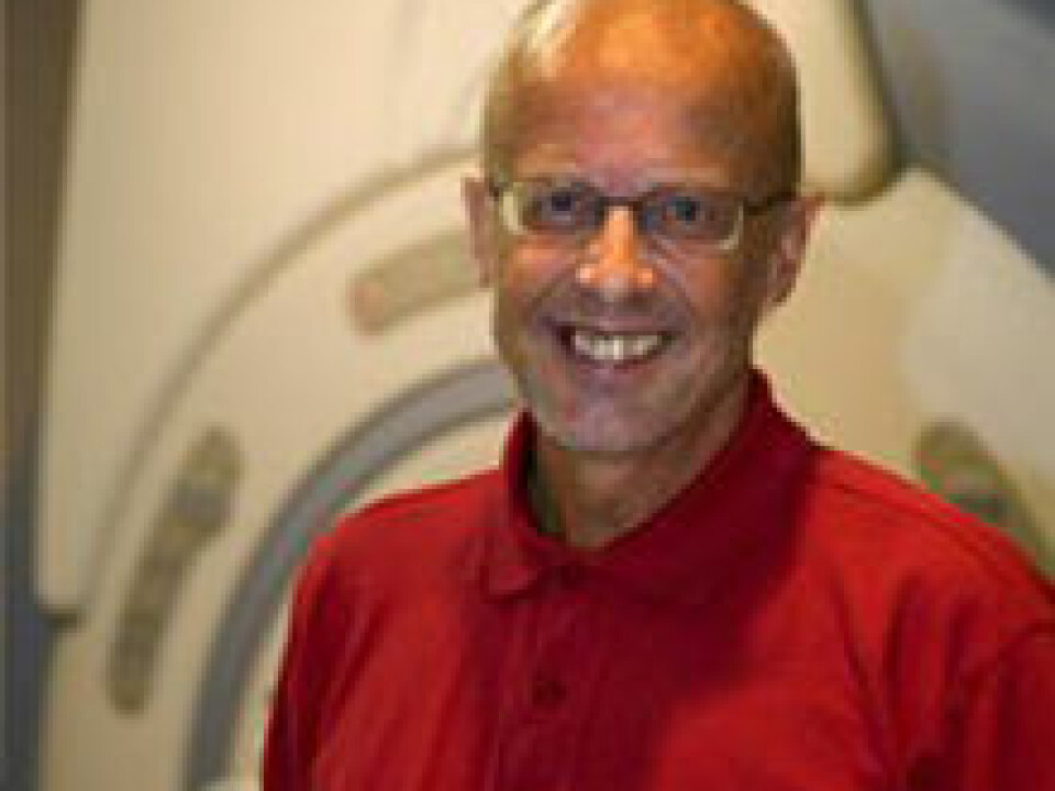 Kenneth Hugdahl in front of the MRI scanner where the examinations are carried out (Photo: Jan Henriksen)