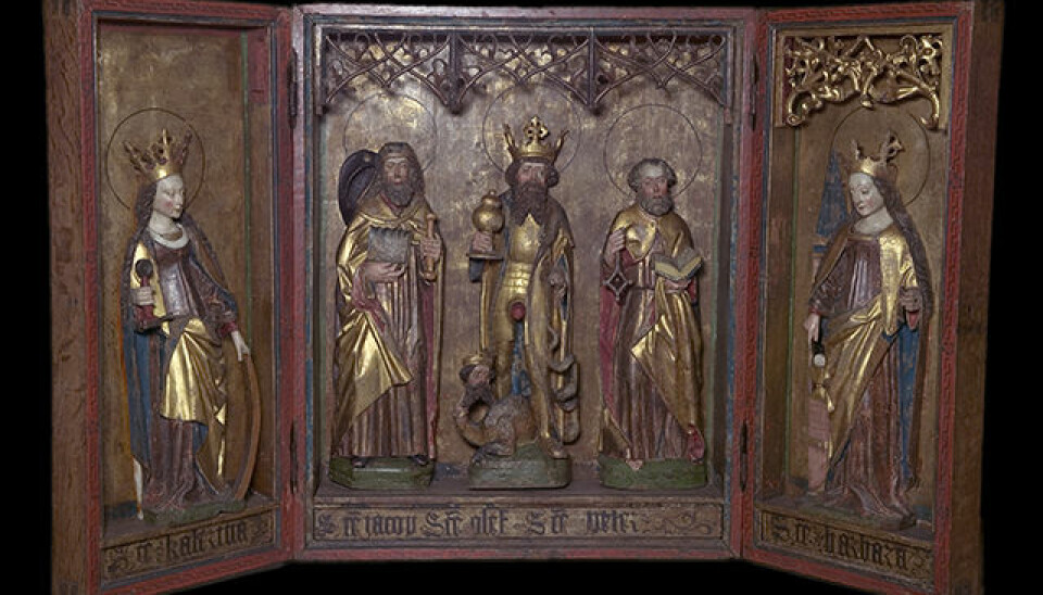 “The altarpieces were the most elevated elements in a church,” says Kristin Kausland. The inside of the case usually contains carved sculptures, while the inside of the doors can also have such sculptures or paintings. This altarpiece is from Kvæfjord church. (Photo: Museum of Cultural History)