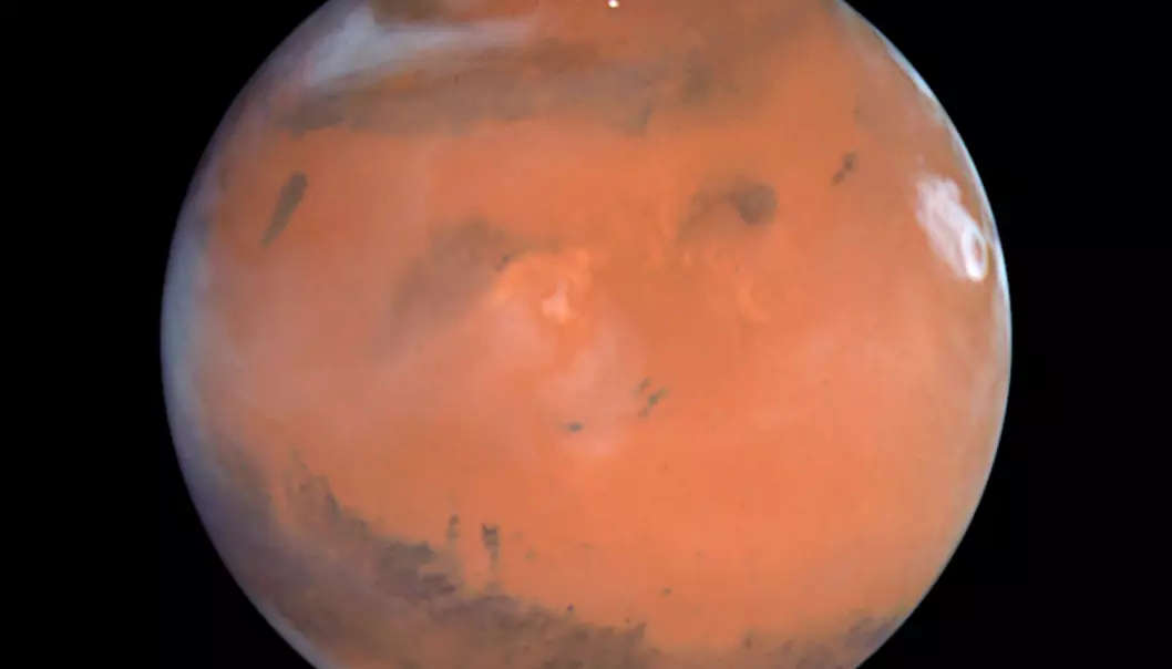 Et bilde av planeten Mars, tatt av romteleskopet Hubble i 1999. De som reiser dit, setter sin egen helse og hjerne på spill.  (Foto: Reuters/NASA/NTB scanpix)