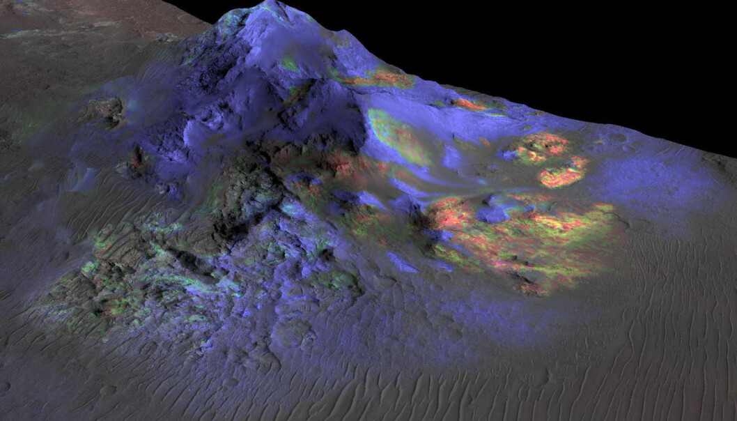 Områder med glass er grønne i dette fargekodede bildet av krateret Alga på Mars. Glasset ble dannet da meteorkollisjoner smeltet stein for milliarder av år siden. Slike glassrester kan inneholde rester av liv, viser lignende funn på jorda. Bildet er laget med data fra den amerikanske romsonden Mars Reconnaissance Orbiter. (Bilde: NASA/JPL- Caltech/Arizona State University) Områder med glass er grønne i dette fargekodede bildet av krateret Alga på Mars. Glasset ble dannet da meteorkollisjoner smeltet stein for milliarder av år siden. Slike glassrester kan inneholde rester av liv, viser lignende funn på jorda. Bildet er laget med data fra den amerikanske romsonden Mars Reconnaissance Orbiter. (Bilde: NASA/JPL- Caltech/Arizona State University)