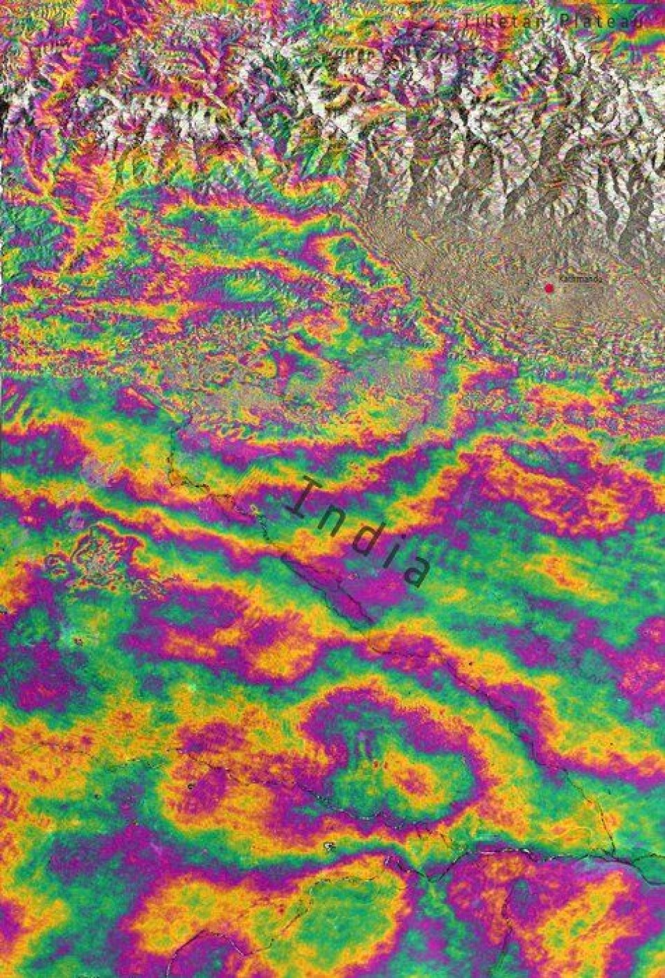 Interferogram av høydeforskjellene i jordskorpa i Nepal (øverst til høyre), og deler av Himalaya og India etter jordskjelvet i Nepal 25. april 2015. Sett av ESAs miljøsatellitt Sentinel-1A. Der fargegraderingene er tettest har jordskorpa beveget seg mest. Her opp til 1 meter fra før jordskjelvet. (Foto: Contains Copernicus data (2015)/ESA/Norut/PPO.labs/COMET–ESA SEOM INSARAP study)