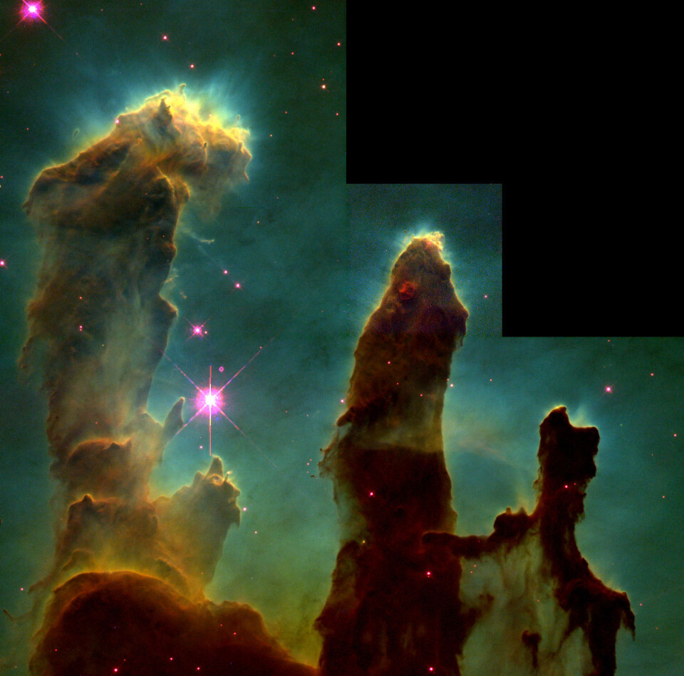 'Pillars of creation' er gigantiske søyler av støv og gass der nye stjerner dannes i Ørnetåken, 7000 lysår borte fra jorda. (Foto: NASA/ESA/Jeff Hester and Paul Scowen (Arizona State University))