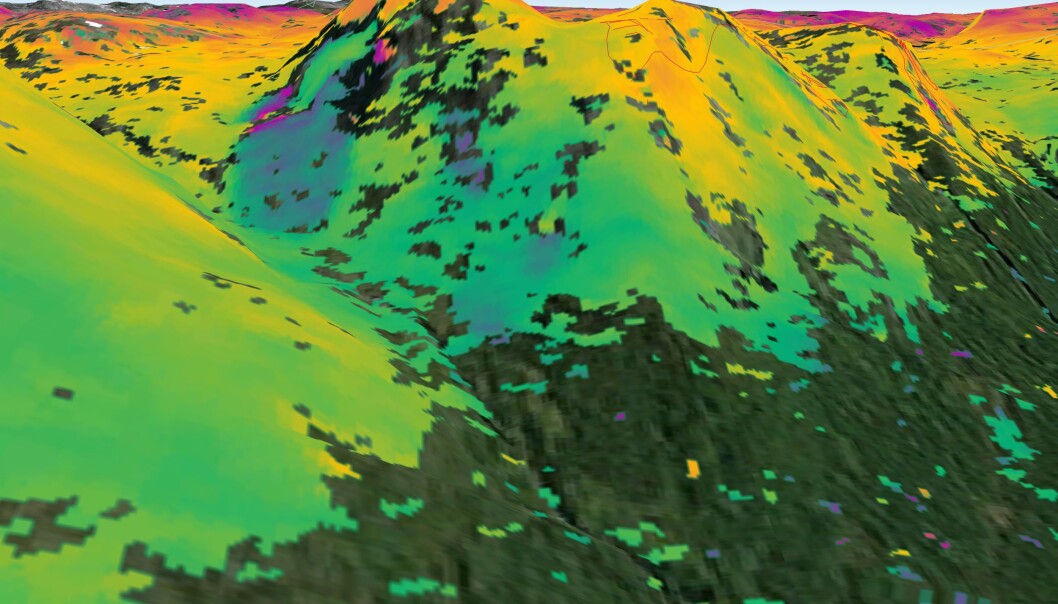 «SAR interferometry» kan brukes til å spå hvor det er risiko for jordskred - her i Kåfjord i Troms. Området på bildet er kjent som ustabilt. Sentinel-1A- radaren skannet området 23. september og 30. august 2014. Der bildet viser blå skygger langs fjellsiden, har underlaget beveget seg omtrent én centimeter i denne perioden. Norske myndigheter bruker teknikken over hele landet for å kunne beregne skredrisiko. (Foto: ESA) «SAR interferometry» kan brukes til å spå hvor det er risiko for jordskred - her i Kåfjord i Troms. Området på bildet er kjent som ustabilt. Sentinel-1A- radaren skannet området 23. september og 30. august 2014. Der bildet viser blå skygger langs fjellsiden, har underlaget beveget seg omtrent én centimeter i denne perioden. Norske myndigheter bruker teknikken over hele landet for å kunne beregne skredrisiko. (Foto: ESA)