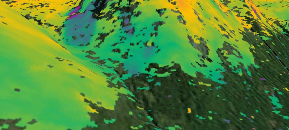 «SAR interferometry» kan brukes til å spå hvor det er risiko for jordskred - her i Kåfjord i Troms. Området på bildet er kjent som ustabilt. Sentinel-1A- radaren skannet området 23. september og 30. august 2014. Der bildet viser blå skygger langs fjellsiden, har underlaget beveget seg omtrent én centimeter i denne perioden. Norske myndigheter bruker teknikken over hele landet for å kunne beregne skredrisiko. (Foto: ESA)
