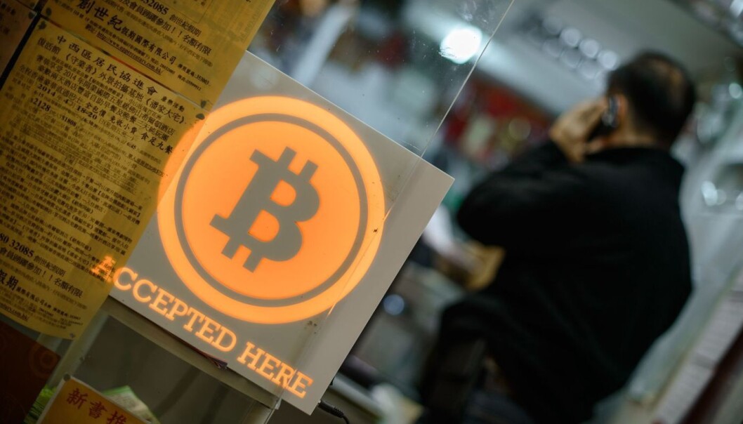 Fra en butikk i HongKong som viser at de tar bitcoin som betaling. (Foto: Afp / Scanpix) Fra en butikk i HongKong som viser at de tar bitcoin som betaling. (Foto: Afp / Scanpix)