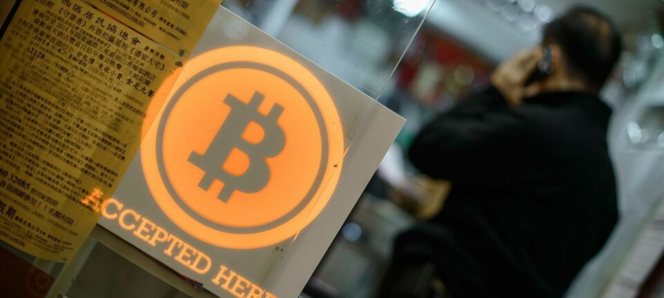 Fra en butikk i HongKong som viser at de tar bitcoin som betaling.  (Foto: Afp / Scanpix)