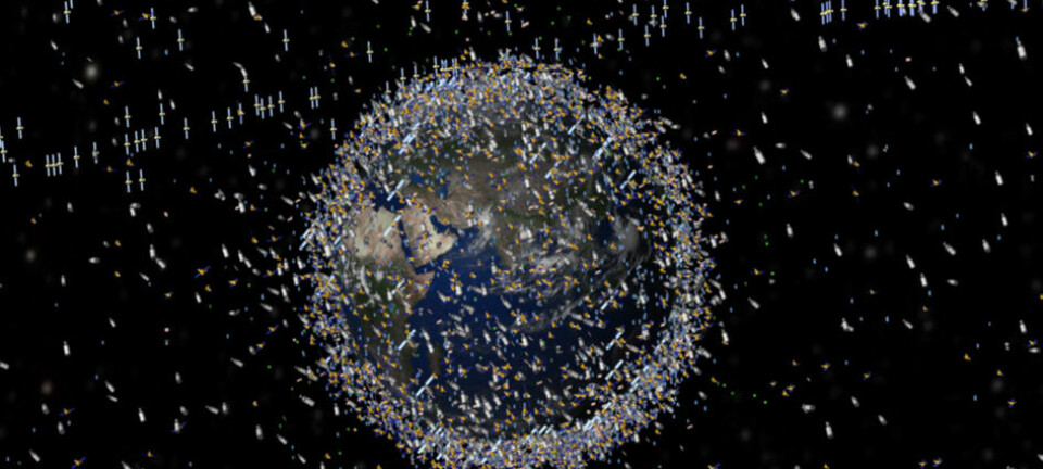 Tusenvis av satellitter er i bane rundt jorden, men de fleste har gått ut av bruk.  (Illustrasjon: ESA)