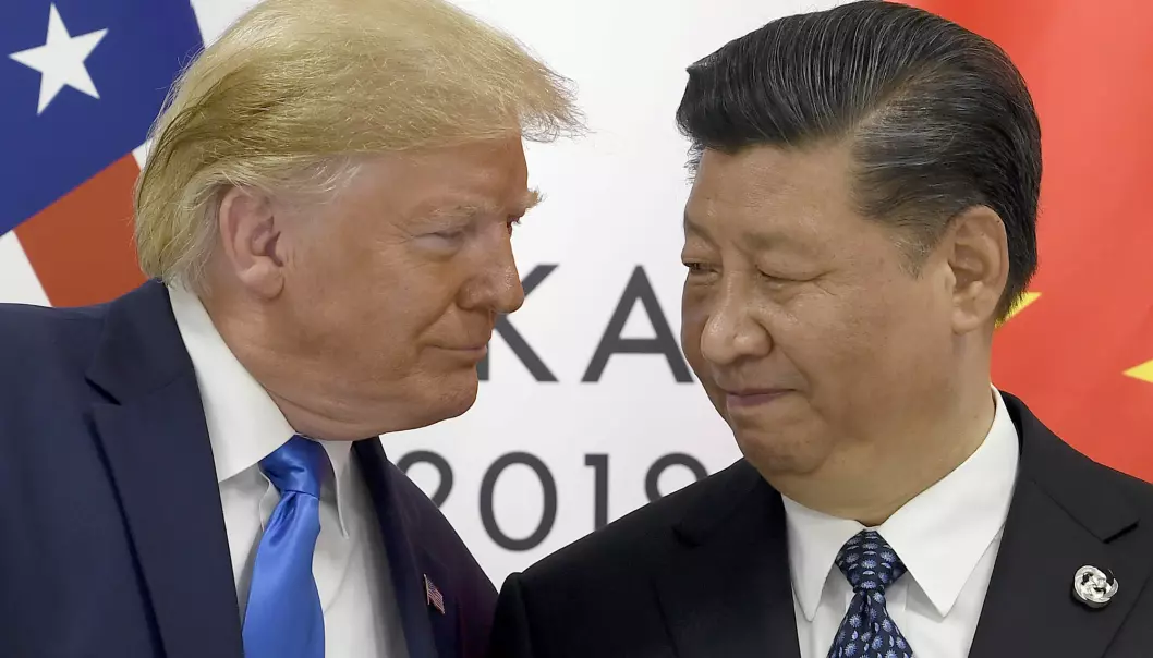 Donald Trump og Xi Jinping møttes under G20-toppmøtet i Japan i juni. De to landene straffer hverandre. USA leder an. (Foto: AP Photo/Susan Walsh(NTB scanpix)