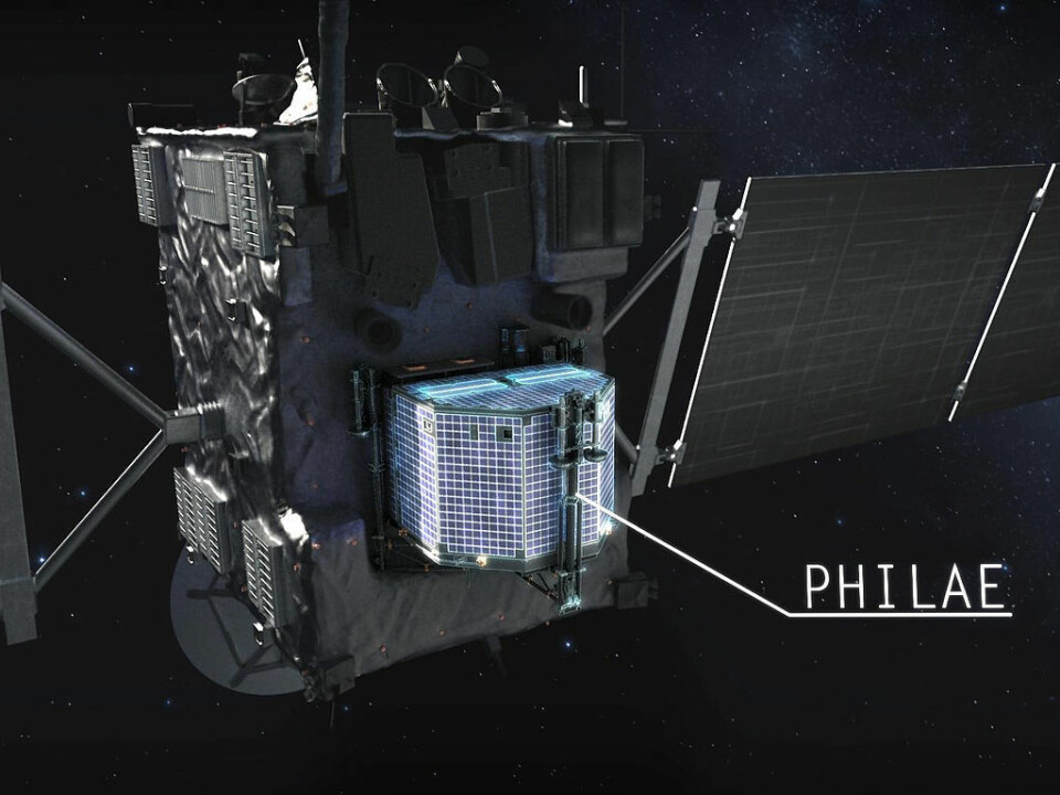 Landingsmodulen Philae mens den fortsatt hang på Rosetta. Sonden er dekket av solcellepaneler.