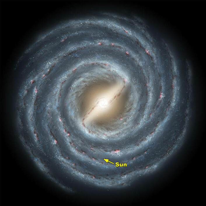 Illustrasjon av vår egen galakse, Melkeveien. Pilen viser hvor den lokale boblen (og solsystemet) ligger.(Illustrasjon: NASA)