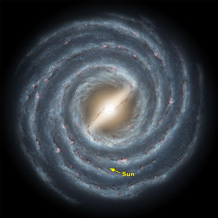 Illustrasjon av vår egen galakse, Melkeveien. Pilen viser hvor den lokale boblen (og solsystemet) ligger.(Illustrasjon: NASA) Illustrasjon av vår egen galakse, Melkeveien. Pilen viser hvor den lokale boblen (og solsystemet) ligger.(Illustrasjon: NASA)