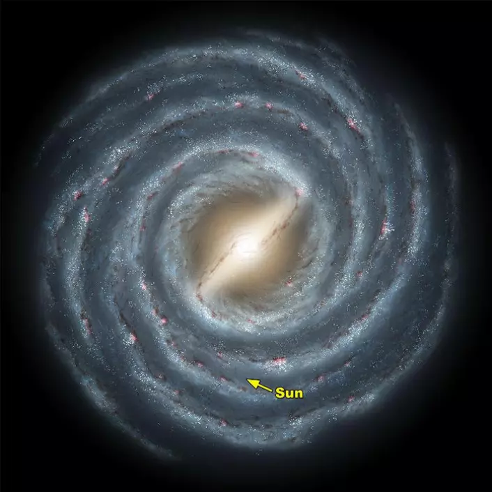 Illustrasjon av vår egen galakse, Melkeveien. Pilen viser hvor den lokale boblen (og solsystemet) ligger.(Illustrasjon: NASA)