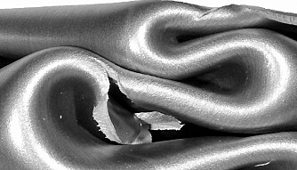 Aluminium profile subjected to crash. The material folds and stretches, resulting in damage. Aluminium profile subjected to crash. The material folds and stretches, resulting in damage.