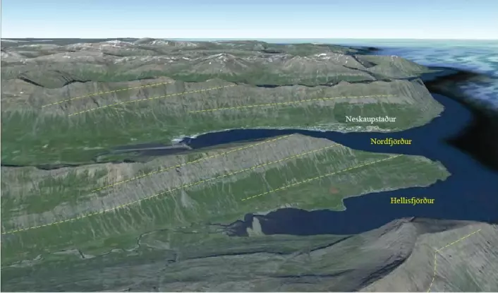 Figur 7. Utsikt mot nord ved Neskaupstaður, lengst øst i Island. Dype fjorder og daler er skåret inn i de ”høyt-flytende” Tertiære lavaplatåene. På grunn av den omfattende innskjæringen av de øvre to km har skorpeplaten lav tetthet. Glasiale erosjonsformer med botner og rygger er lett synlige nederst til høyre. Lavastrømenhetene heller svakt i vestlig retning mot den Nordlige riftsonen utenfor bildeutsnittet. Helningen skyldes nedbøyning av skorpen som følge av innsynkning av den vulkanske lasten som pålagres i riftsonene. Klikk her for større versjon. (Foto: Google Earth)
