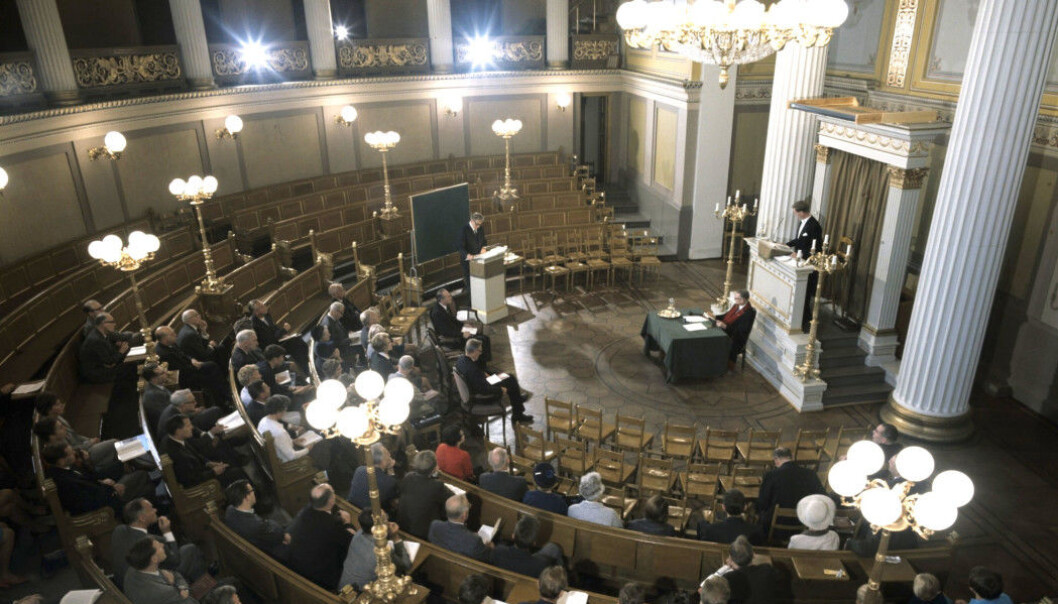 A candidate defends his phd dissertation in 1967 in the auditorium at the University of Oslo in the city centre. A candidate defends his phd dissertation in 1967 in the auditorium at the University of Oslo in the city centre.
