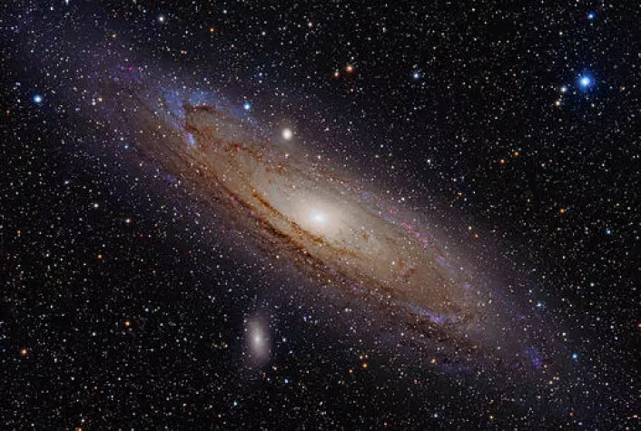Spiralgalakser som vår egen Melkeveien og nabogalaksen Andromeda (bildet) kan gå gjennom smultringfaser tidlig og seint i sin utvikling, foreslår en fagartikkel fra 1972. (Foto: Adam Evans/Wikimedia Commons)