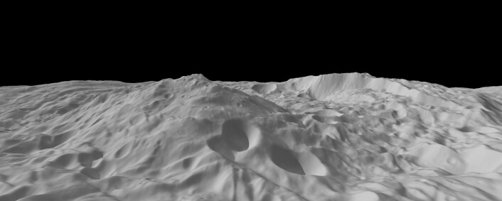 Fig. 3. Beregnet skråstilt topografi-modell av sentralfjellet i Rheasilvia-krateret med en bratt kraterkant i bakgrunnen.  Legg merke til store masseutglidninger foran den bratte kraterkanten. (Foto: (Bilde: NASA/JPL-Caltech/UCLA/MPS/DLR/IDA))