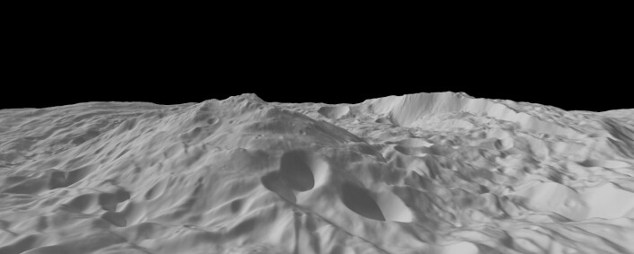 Fig. 3. Beregnet skråstilt topografi-modell av sentralfjellet i Rheasilvia-krateret med en bratt kraterkant i bakgrunnen. Legg merke til store masseutglidninger foran den bratte kraterkanten. (Foto: (Bilde: NASA/JPL-Caltech/UCLA/MPS/DLR/IDA)) Fig. 3. Beregnet skråstilt topografi-modell av sentralfjellet i Rheasilvia-krateret med en bratt kraterkant i bakgrunnen. Legg merke til store masseutglidninger foran den bratte kraterkanten. (Foto: (Bilde: NASA/JPL-Caltech/UCLA/MPS/DLR/IDA))