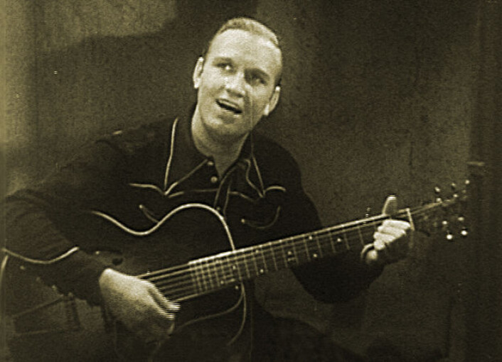 Gene Autry, også kjent som den syngende cowboy eller jodleren fra Oklahoma, her under avsynging av Oh Susannah. (Foto: Joseph Kane, Wikimedia Commons) Gene Autry, også kjent som den syngende cowboy eller jodleren fra Oklahoma, her under avsynging av Oh Susannah. (Foto: Joseph Kane, Wikimedia Commons)