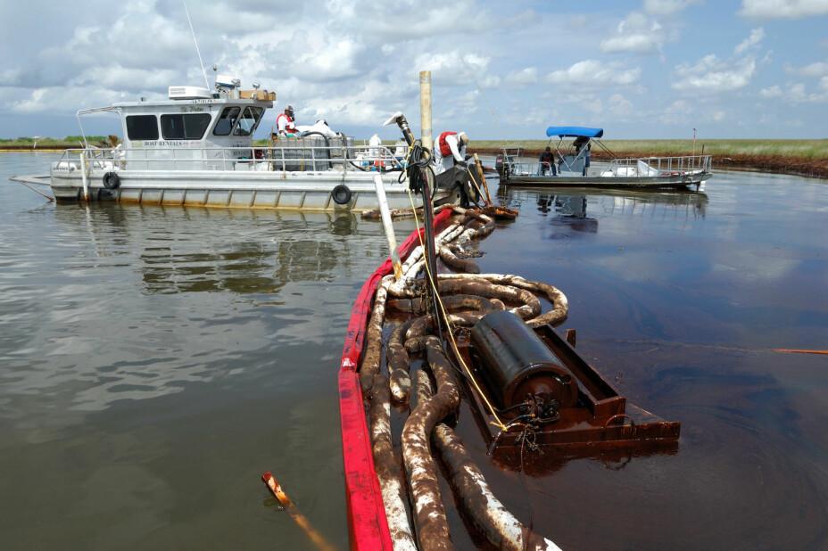 Cleaning up some of the oil from the Deepwater Horizon accident. Oil from the spill coated nearly 1000 km of coastline.