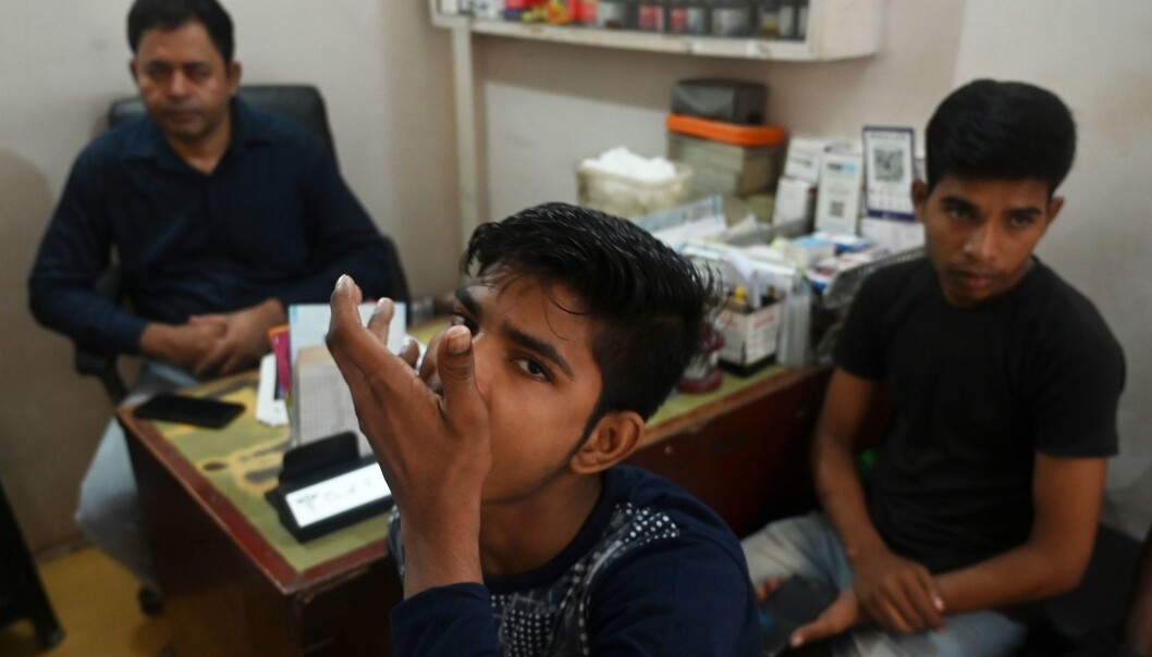In this photograph taken on September 26, 2019, a tuberculosis patient takes his daily dose of medicine at a DOTS (directly observed treatment, short-course) Centre in New Delhi. A new study using Ethiopa as a case finds that adhering to the DOT-strategy in a rigid manner may put patients at more risk, as their lives may not allow for visits to the clinic where pill swallowing can be observed. In this photograph taken on September 26, 2019, a tuberculosis patient takes his daily dose of medicine at a DOTS (directly observed treatment, short-course) Centre in New Delhi. A new study using Ethiopa as a case finds that adhering to the DOT-strategy in a rigid manner may put patients at more risk, as their lives may not allow for visits to the clinic where pill swallowing can be observed.