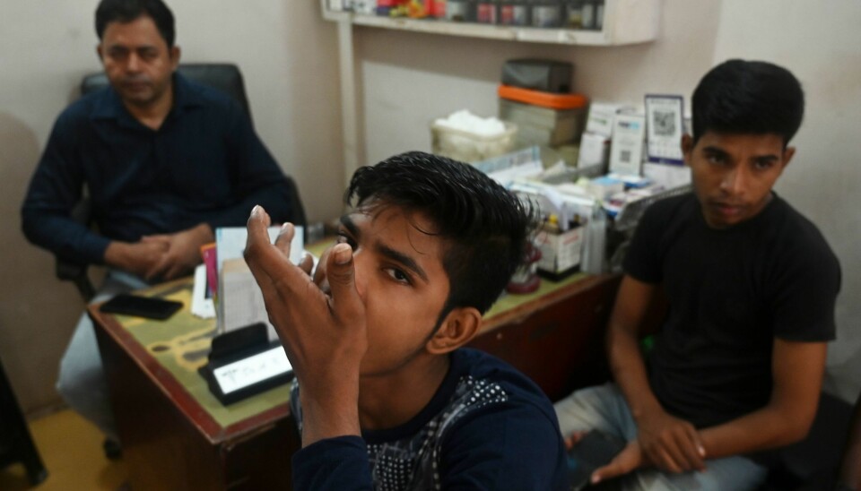 In this photograph taken on September 26, 2019, a tuberculosis patient takes his daily dose of medicine at a DOTS (directly observed treatment, short-course) Centre in New Delhi. A new study using Ethiopa as a case finds that adhering to the DOT-strategy in a rigid manner may put patients at more risk, as their lives may not allow for visits to the clinic where pill swallowing can be observed.