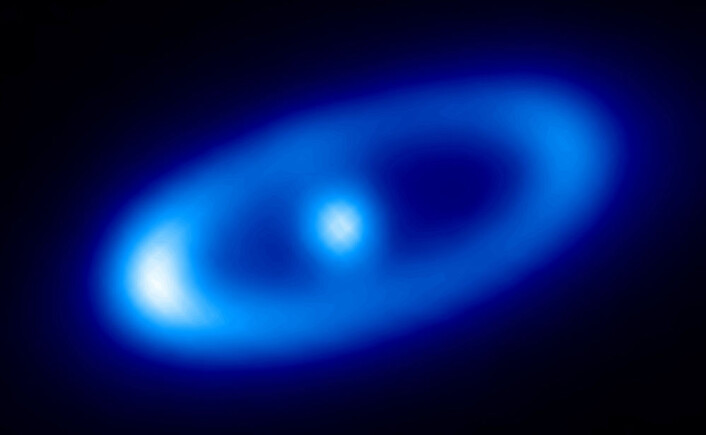 Den unge stjernen Fomalhaut, med en skive av støv rundt seg, fotografert av romteleskopet Herschel. (Foto: ESA) Den unge stjernen Fomalhaut, med en skive av støv rundt seg, fotografert av romteleskopet Herschel. (Foto: ESA)