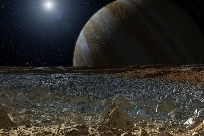 Slik ser NASA for seg at det ser ut på overflaten av Europa, med Jupiter i horisonten. (Foto: NASA/JPL-Caltech) Slik ser NASA for seg at det ser ut på overflaten av Europa, med Jupiter i horisonten. (Foto: NASA/JPL-Caltech)